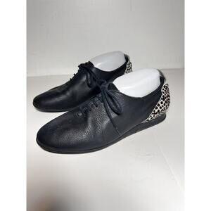 Arche Black Leather Lace-Up Flats with Leopard Heel Accent